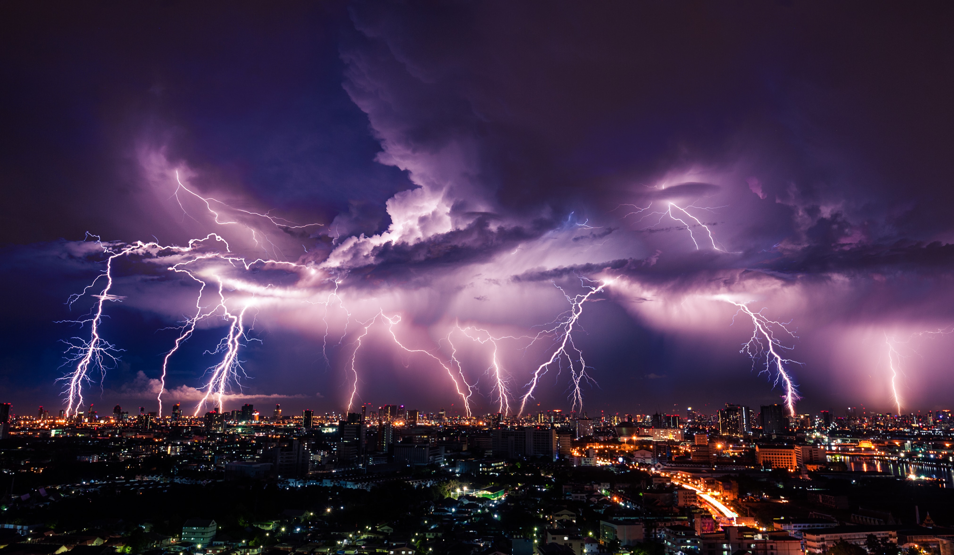 lightining over a city